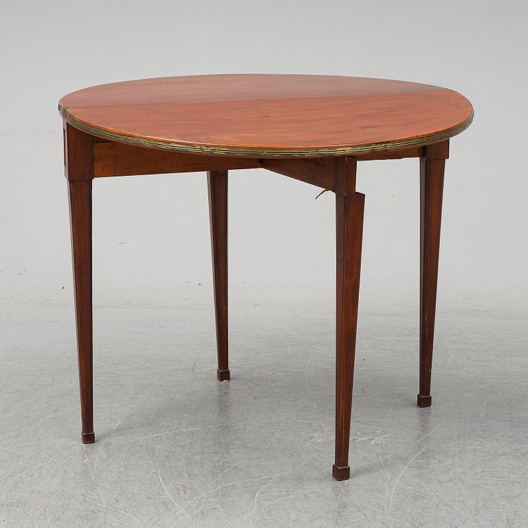 A Directoire games table.