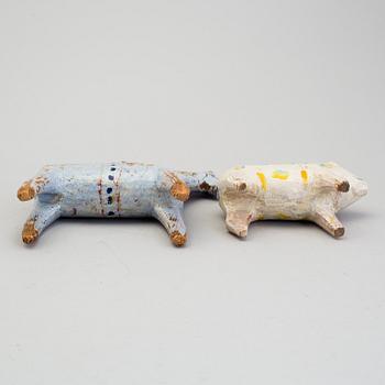 A painted folk art dala horse and dala pig, first half of the 20th century.