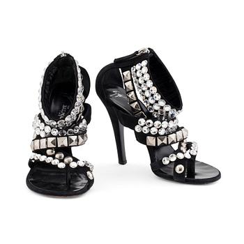 403. BALMAIN, a pair of black suede sandals with decorative embellishment.