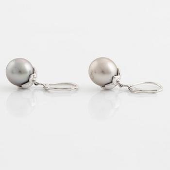 A pair of cultured pearl and brilliant cut diamond earrings.