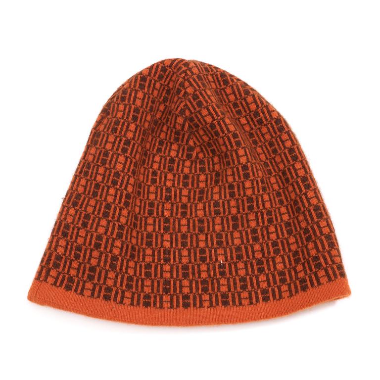 A 2000s orange/brown hat by Hermès.