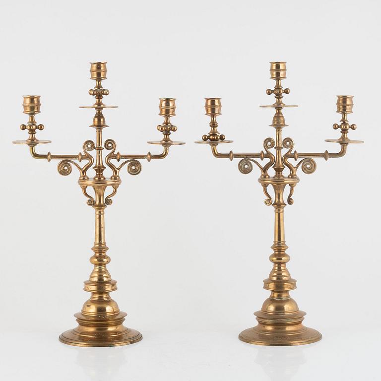 A pair of brass candelabra, Gusums Bruk, circa 1900.