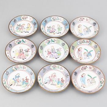 A set of 9 enamel on copper dishes, early 20th Century.