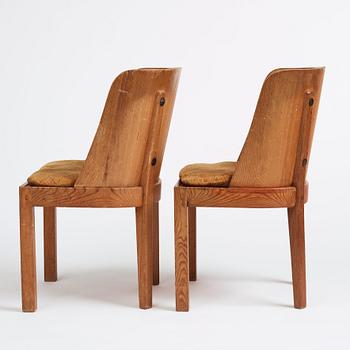 Axel Einar Hjorth, a pair of stained pine 'Lovö' chairs, Nordiska Kompaniet, Sweden 1930s.