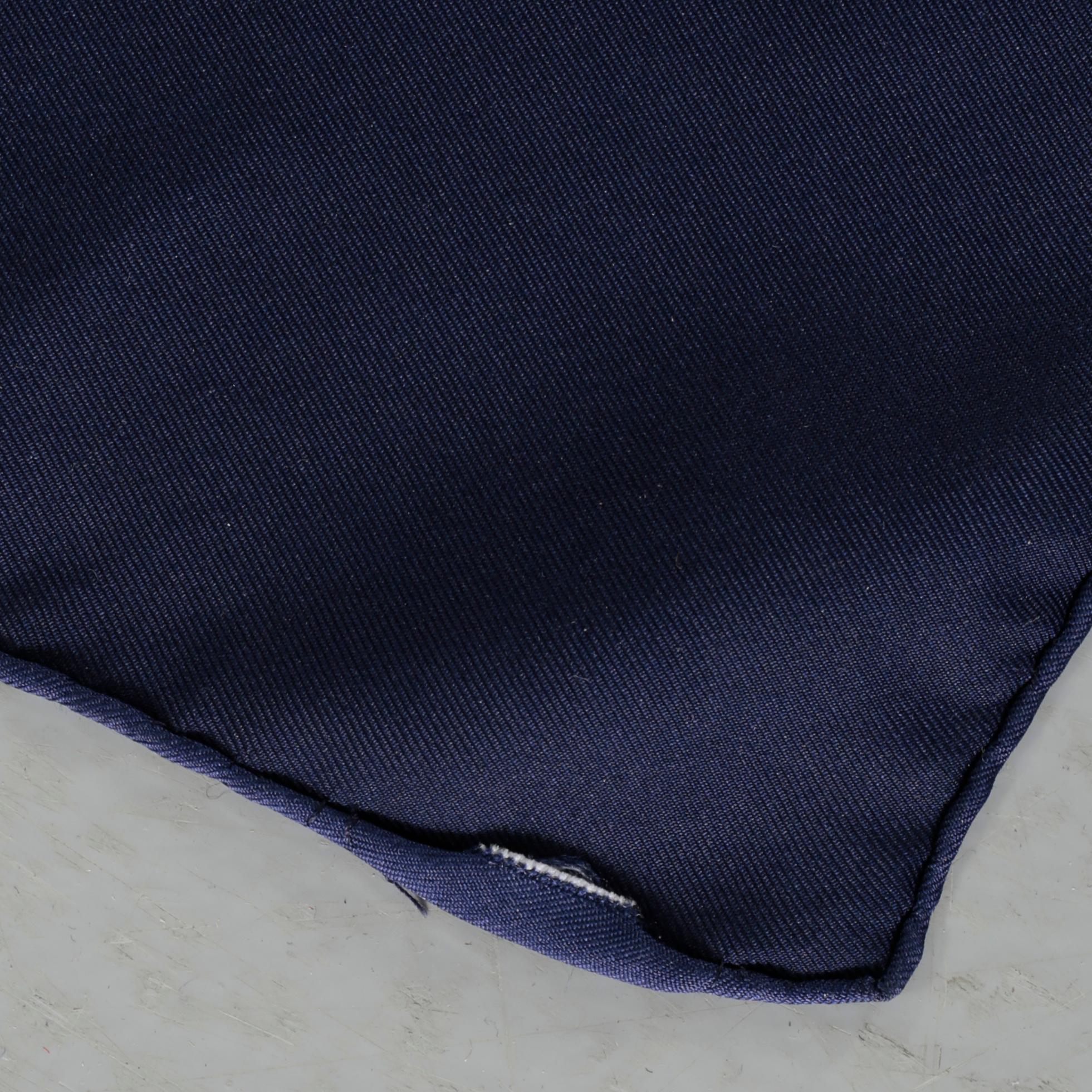HERMÈS, "Tibet" scarf, and brooch.
