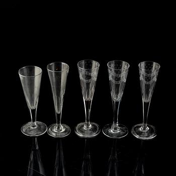 Five antique champagne glasses.