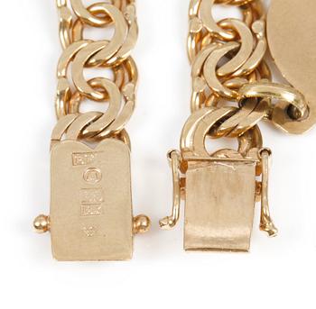 ARMBAND, 18 k guld, med ametist, 1952. Totalvikt ca 21 gram.