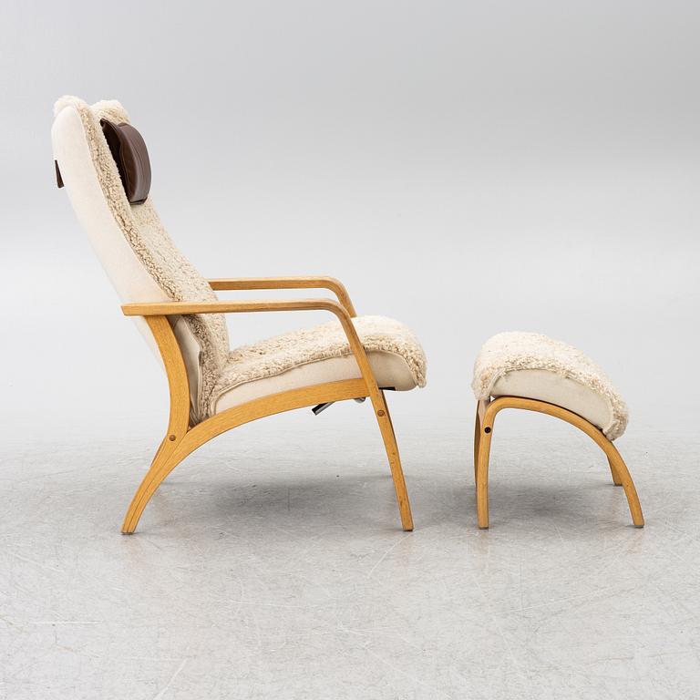 A 'Delta Adventure' armchair with footstool, Brunstad AS, Norway.