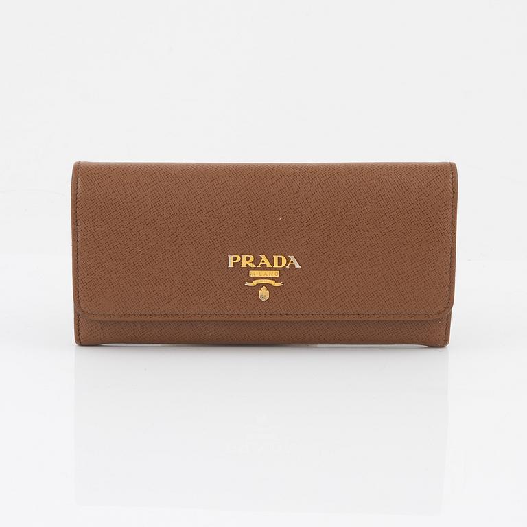 Prada, a brown saffiano wallet.