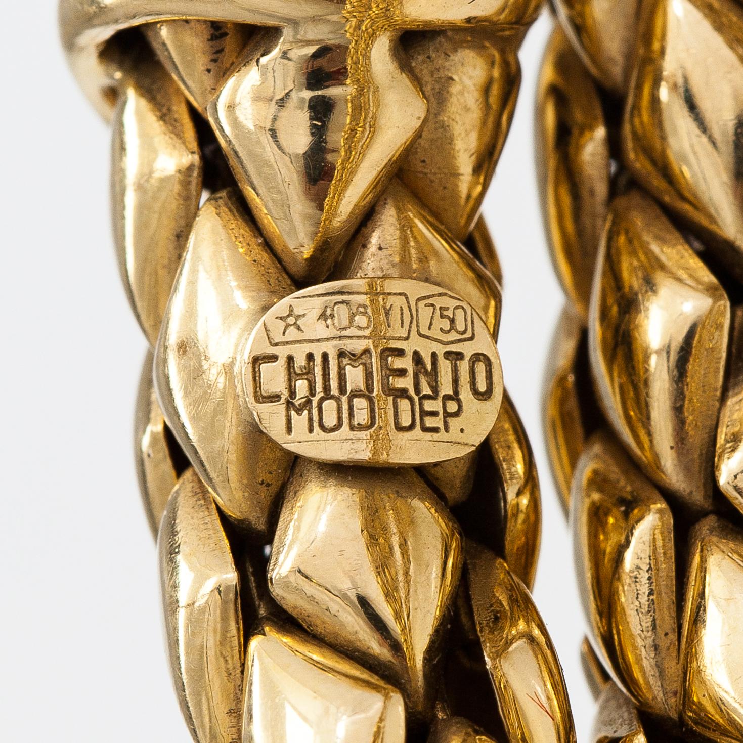 Chimento, An 18K gold snake bracelet with rubies and diamonds ca. 0.46 t in total. Italy.