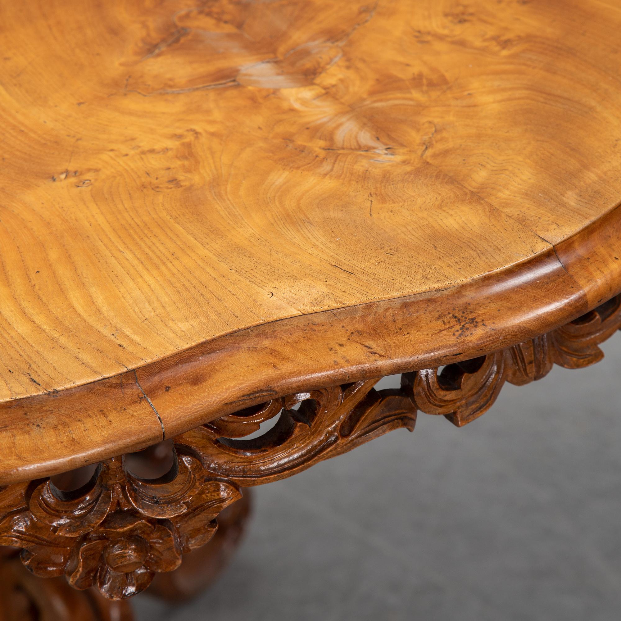A rococo-style table from the second half of the 20th century.
