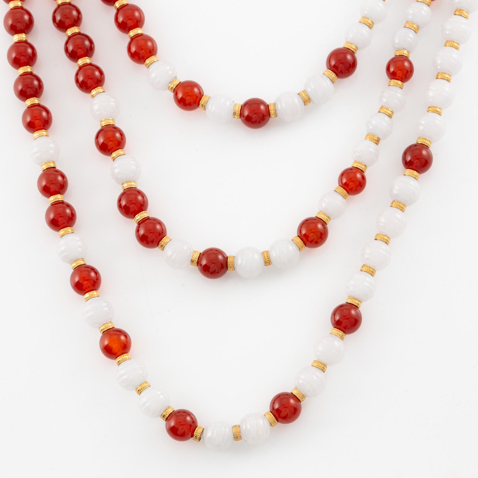 Lalique, necklace, "L'Oiseau de Feu", 18K gold with fire opal, sapphires, and diamonds on black jade.