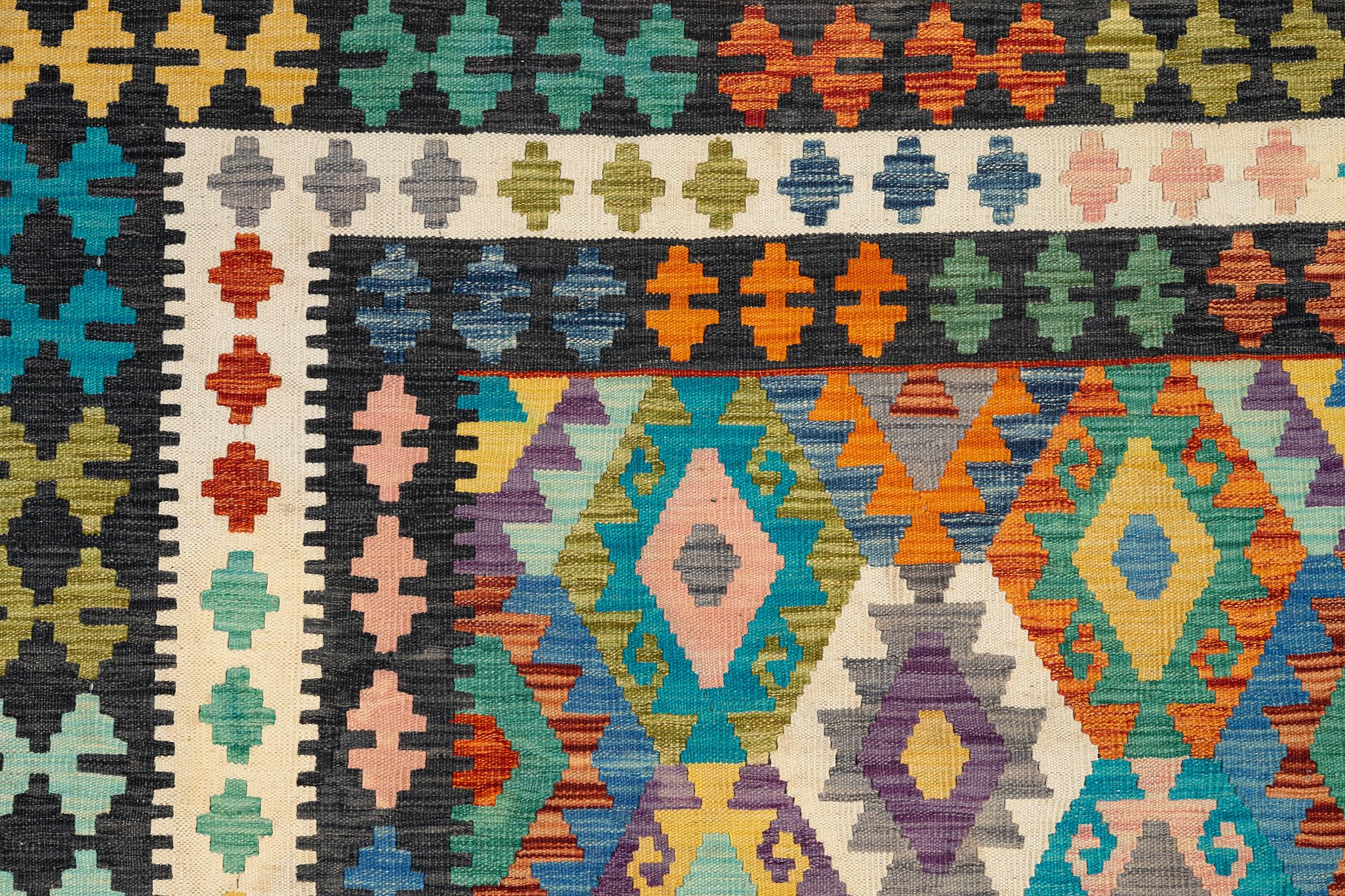 An, Afghan kilim carpet, c. 496 x 319 cm.