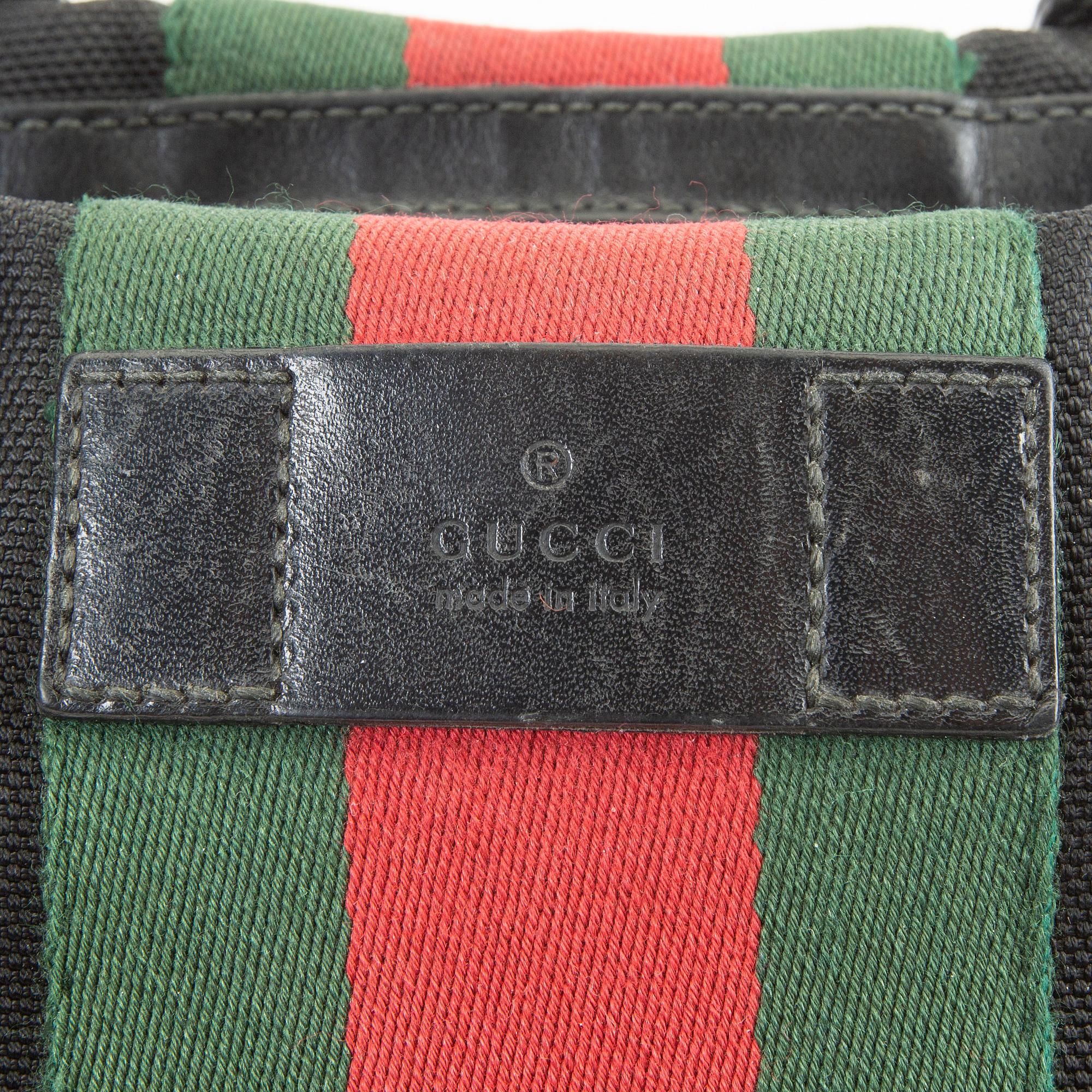 A Techno Web Stripe Canvas Tote  by Gucci.