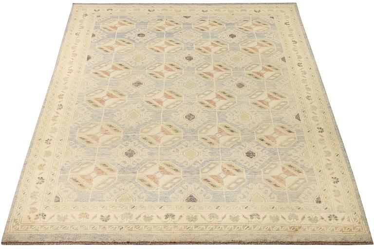 A Kazak carpet, c. 289 x 194 cm.