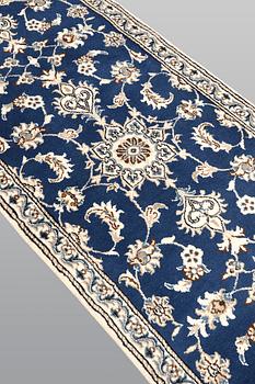 A Nain runner, ca 289 x 79 cm.