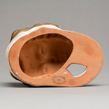 An Adolf Prischl terracotta wall mask for Goldscheider, mid 1900.