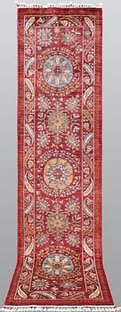 A carpet, Ziegler Design, c. 307 x 78 cm.