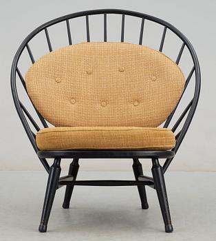 A Sven Engström & Gunnar Myrstrand black lacquered easy chair, 'Bågen', Nässjö Stolfabrik, Sweden 1950's.