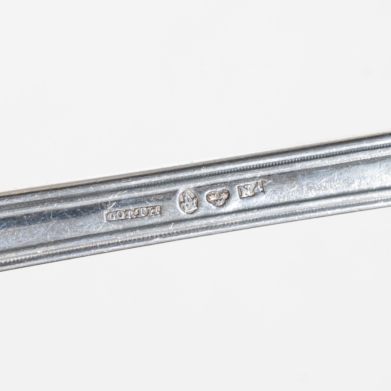 27 pieces of silver flat ware, similar 'Shell' models, including Gustaf Mööenborg, Stockholm, Swedn, 1848-52.