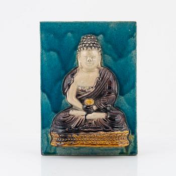 A Chinese wall placque with a budda, 20th Century.