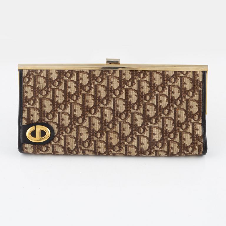 Christian Dior, a canvas clutch.