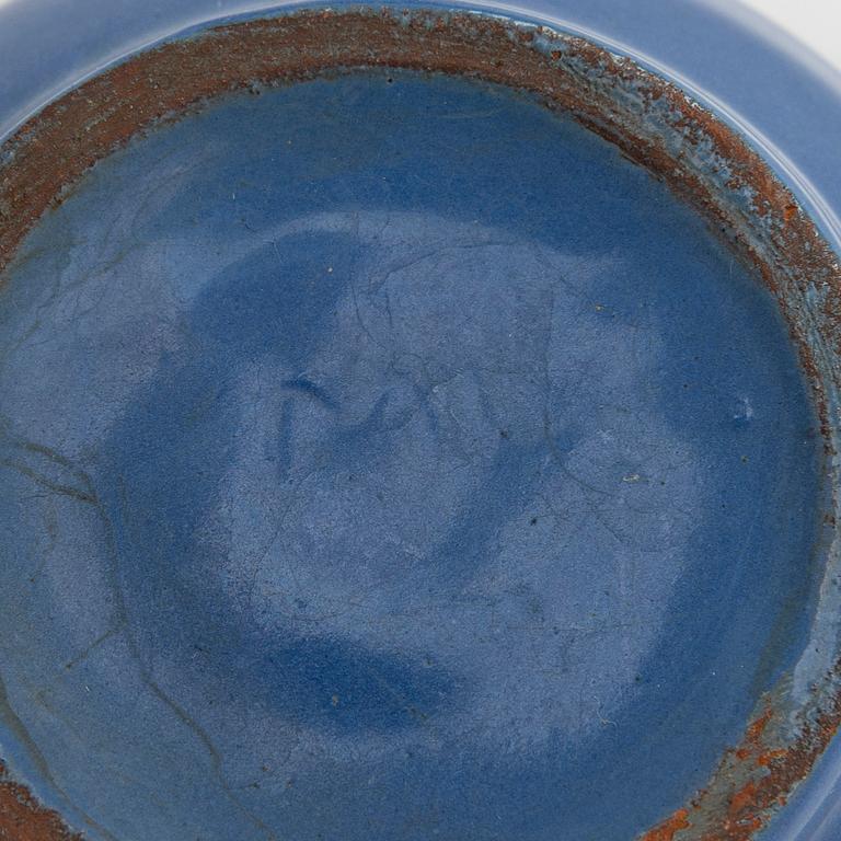 Marita Lybeck, a set of three ceramic plates and cream jug, red clay, signed ML.