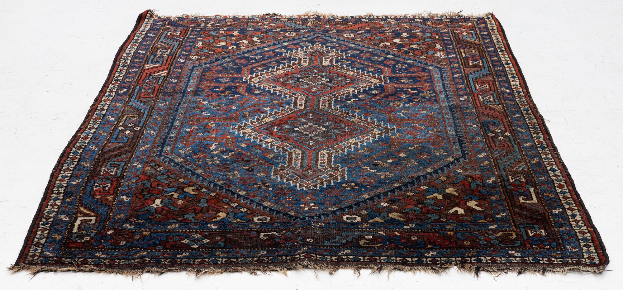 A Khamseh rug, antique, c. 192 x 155 cm.