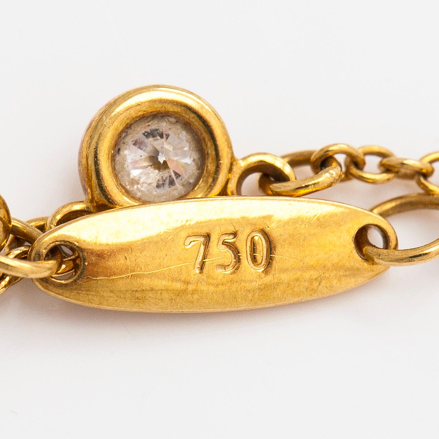 Tiffany & Co, Elsa Peretti, an 18K gold 'Diamonds by the Yard' necklace with a brilliant-cut diamond.