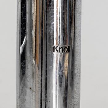 An 'Oval 96' table by Florence Knoll for Knoll International.
