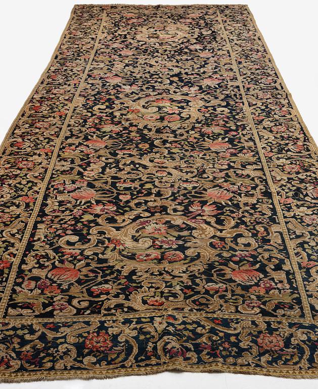 A Karabagh runner, South Caucasus, c. 649 x 228 cm.