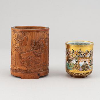 A Japanese satsuma cup and a Chinese bamboo brush holder, 20th century.