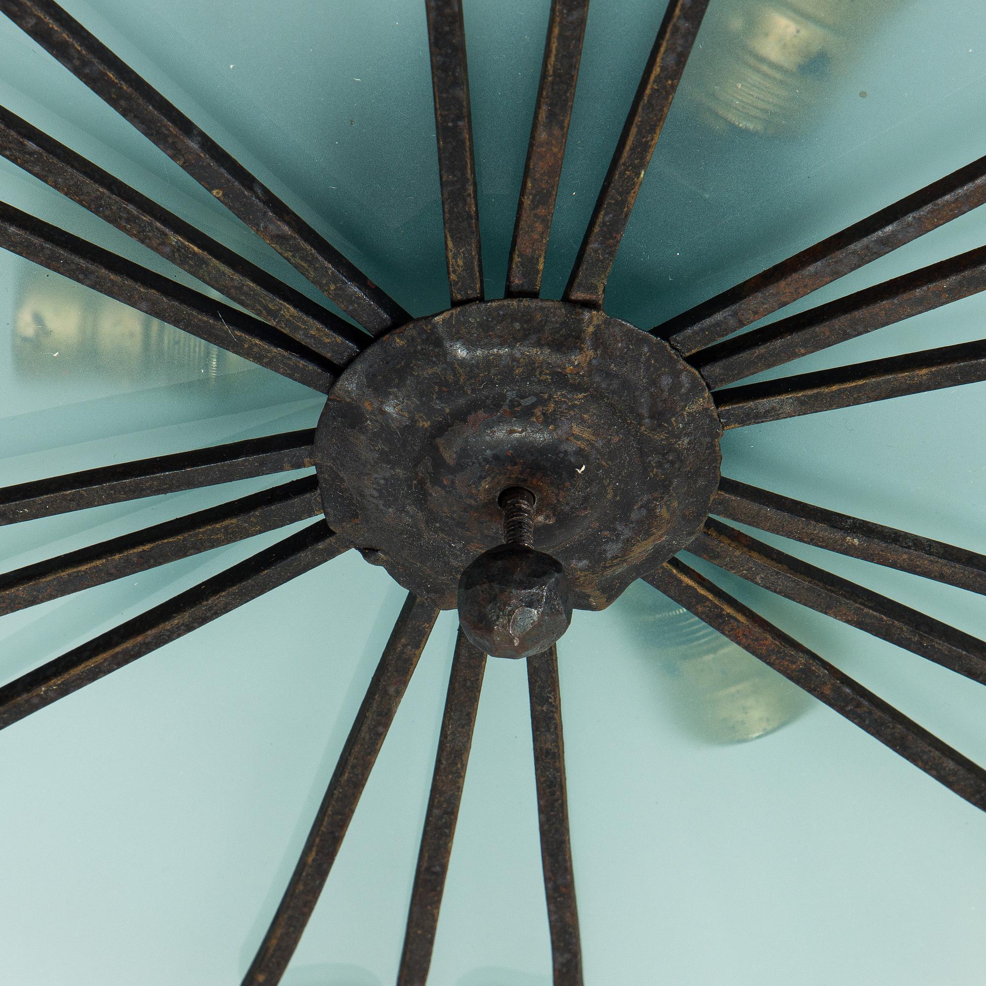 An early 20th century ceiling light.