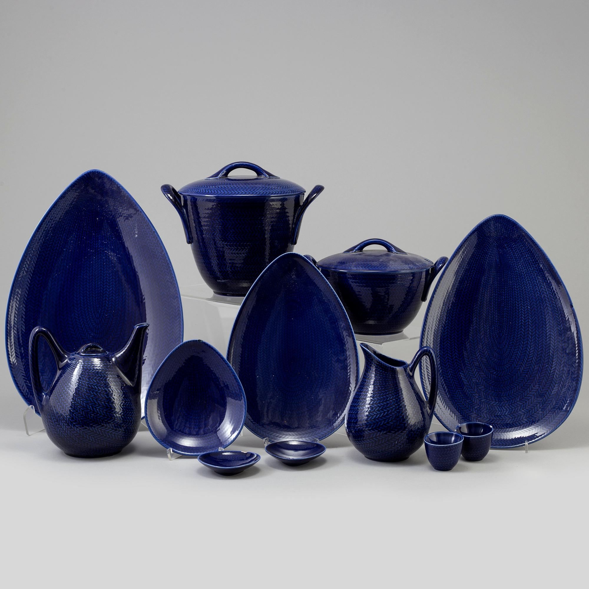 A Swedish Rörstrand 'Blå Eld' part dinner service. Design by Herta Bengtsson. (41 pieces).