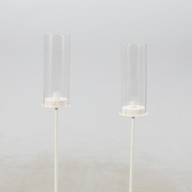 Hans-Agne Jakobsson, two floor candlesticks, metal/forge, late 20th century.