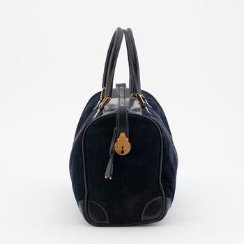 GUCCI, a blue suede and leather weekendbag.