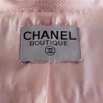 A pink jacket by Chanel.