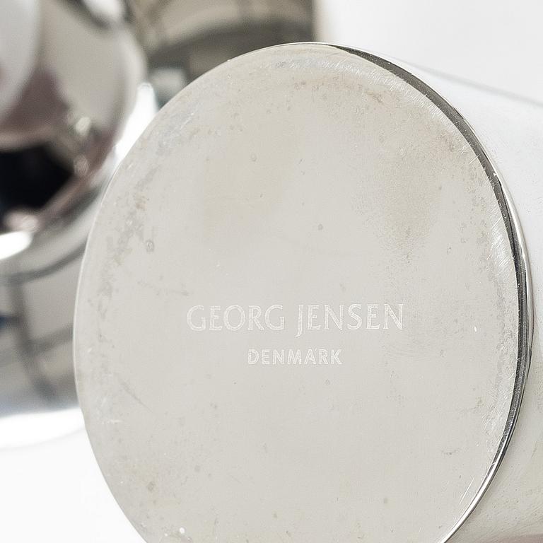 Georg Jensen, Three 'Ellipse' candelabra.