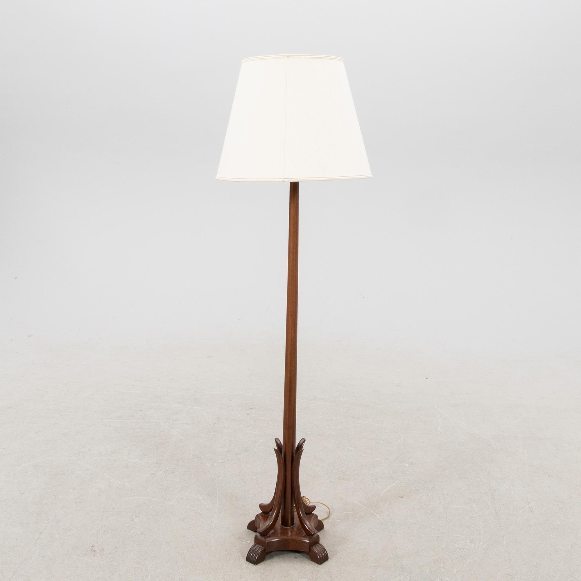 A wooden floor lamp first half of the 20th century.