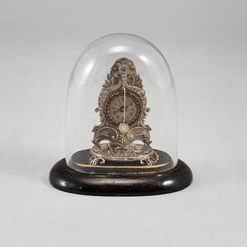 A 19th century miniature silver mantle clock.