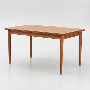 A teak-veneered dining table, 1960's/70's.