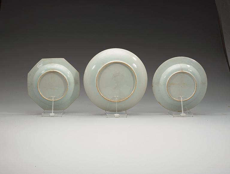A set of six (4+2) famille rose 'double peacock' dishes and a serving dish, Qing dynasty, Qianlong (1736-95).