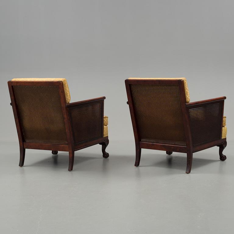 a pair of chippendale style armchairs from the 1930's/-40's.