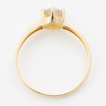 18K gold ring with an old-cut diamond.
