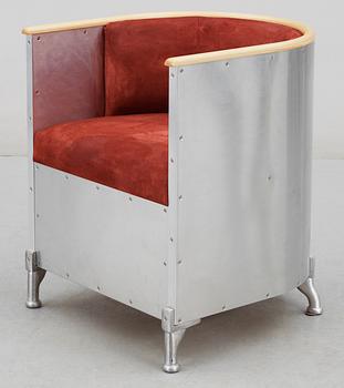 A Mats Theselius aluminium and suede armchair by Källemo AB.
