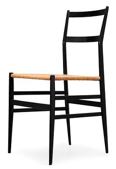 640. A Gio Ponti 'Superleggera' chair, Cassina, Italy, black painted ash with ratten seat.