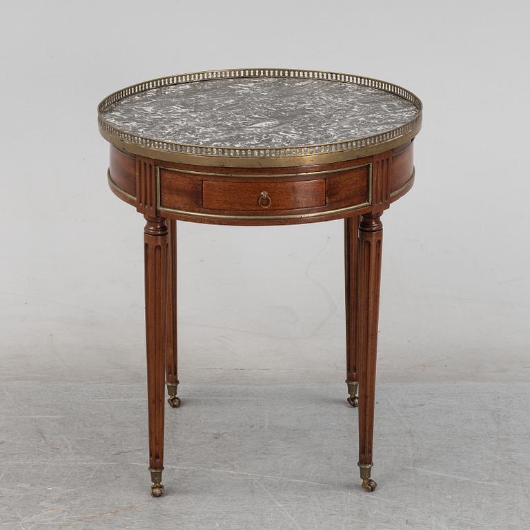 A Louis XVI-style table end of the  19th Century.