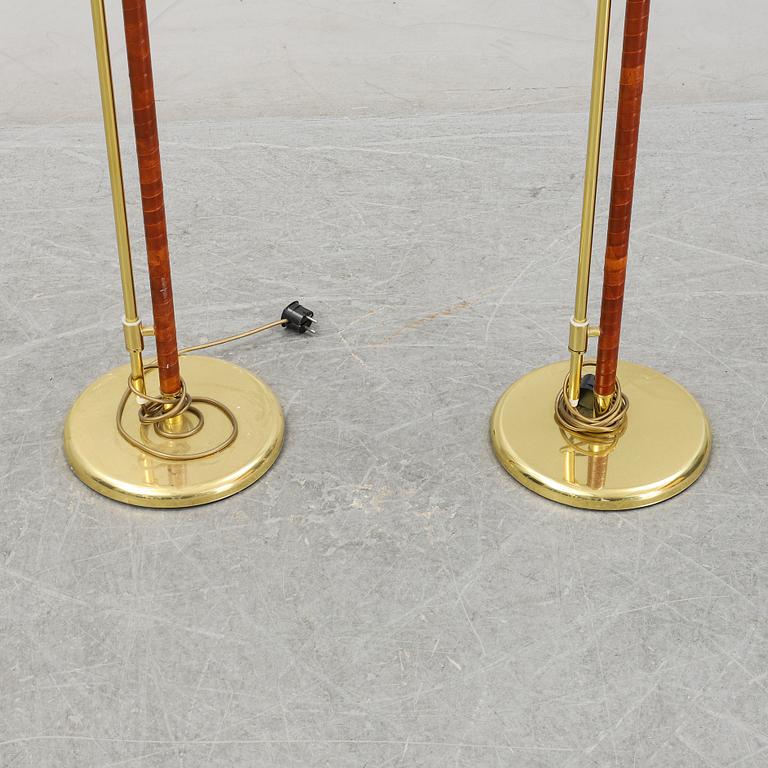 A pair of brass and leather floor lamps, Örsjö Designe, 21st century.