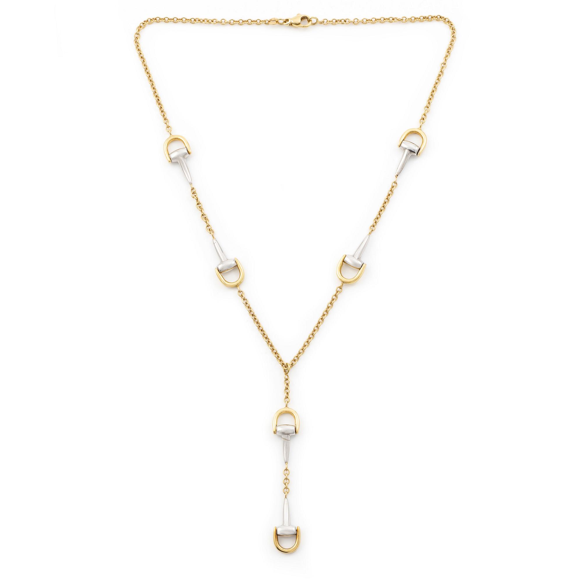 Collier 18K guld och vitguld, med motiv av hästbett.