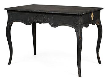 801. A Rococo writing table.
